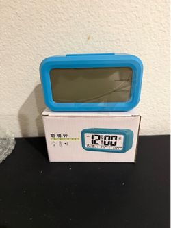 Brand new blue alarm clock