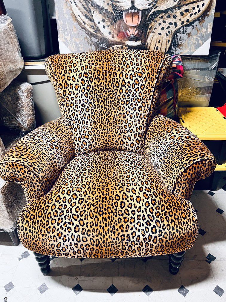 Moving Need To Sale Fast This Cheetah Print Chair With Ottoman 