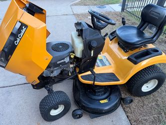 Cadet riding lawnmower with Ramps