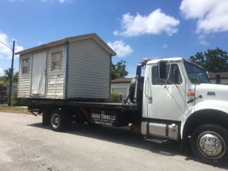 Sheds relocated.... movemo casita