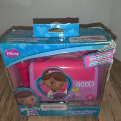 Disney Doctora Jugetes Sing Along Karaoke 2014 Sakar. Packaging has some damage and wear from age and storage. Sold as is.