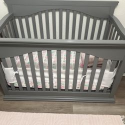 Gray crib And Changing Table With Drawers 