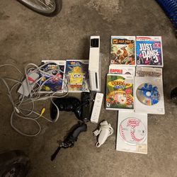 Wii With Games Controllers And All Cords