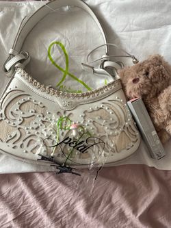REM beauty bear and Sam Edelman bag