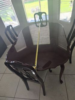 Dinning Room Set Has A Leaf That Can Seat 6 comes wit 8 chair one broke on leg pick up only