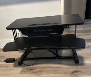 Electric desk riser
