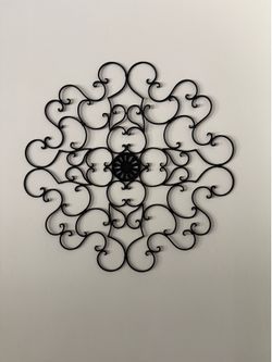 Metal wall decorations.  5 pieces