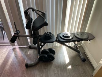 Multi functional workout bench (Weights Included)