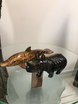 Gorgeous Hand Carved  And Hand Painted  Wooden  Animal Figurines.  Fish is 12.5 inch L and 3.5 inch H and a Rhinoceros L -8 inch and H- 4.5 inch.