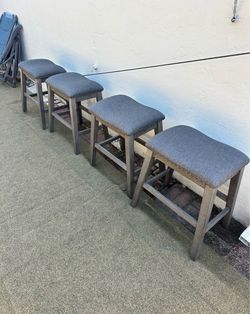4 Gray Upholstered Bar Stools with Nailhead Trim - Signature Design by Ashley Caitbrook Rustic 24.4"