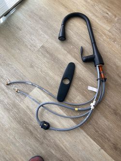 Free used tall kitchen faucet, black
