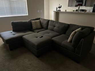 Two piece sectional couch with ottoman
