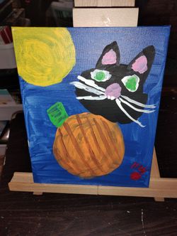 Black cat In pumpkin 