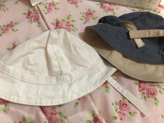 Two baby boy hats