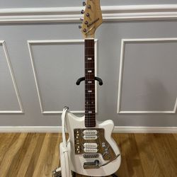 1960’s Japanese Guyatone Guitar set up with lock tuners a leather white stap and snap strap locks. $400 obo