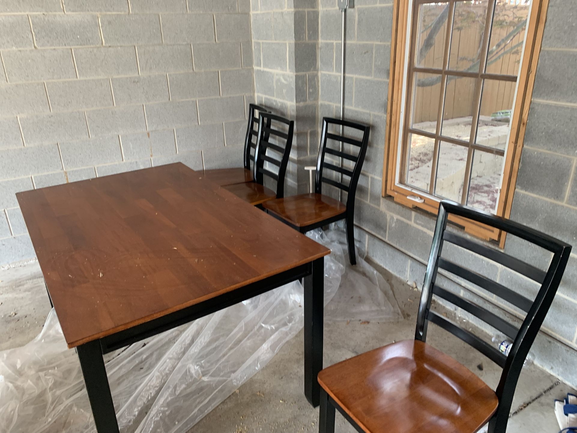 Table And Four Chairs.