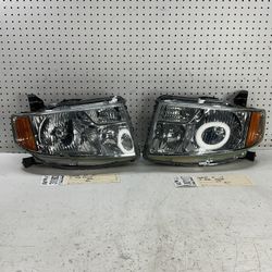 2009 2011 HONDA ELEMENT HEADLIGHT PAIR OEM 