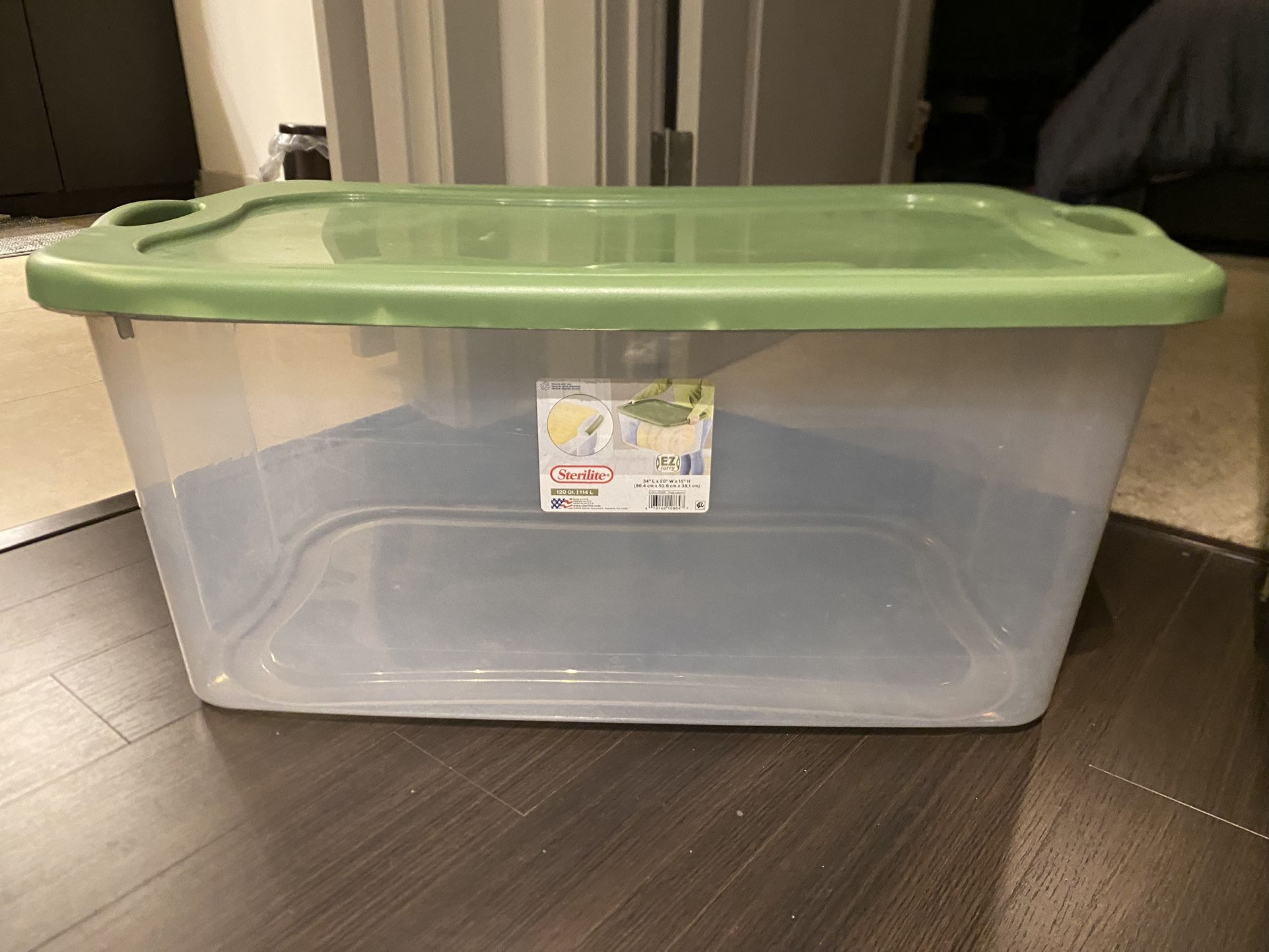 Sterilite 120 Quart EZ Carry, Extra Large Clear Plastic Storage Bin with Full-Grip Handles, Green