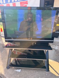 LG Flat Screen TV with Glass Stand