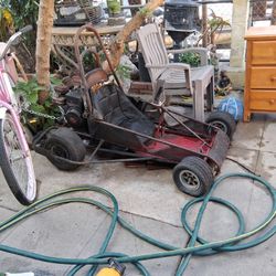 Vintage go Kart like early 50s are late 60s.\nRomne's motors, good still runs need to be restored.Painted a good fixer opera