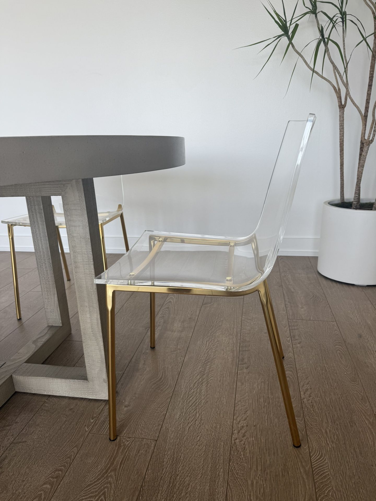Clear/Gold Acrylic CB2 Dining Chairs
