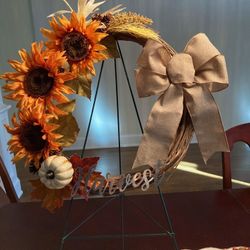One of a kind 16” handmade fall wreath. Perfect for decorating or as a housewarming gift!