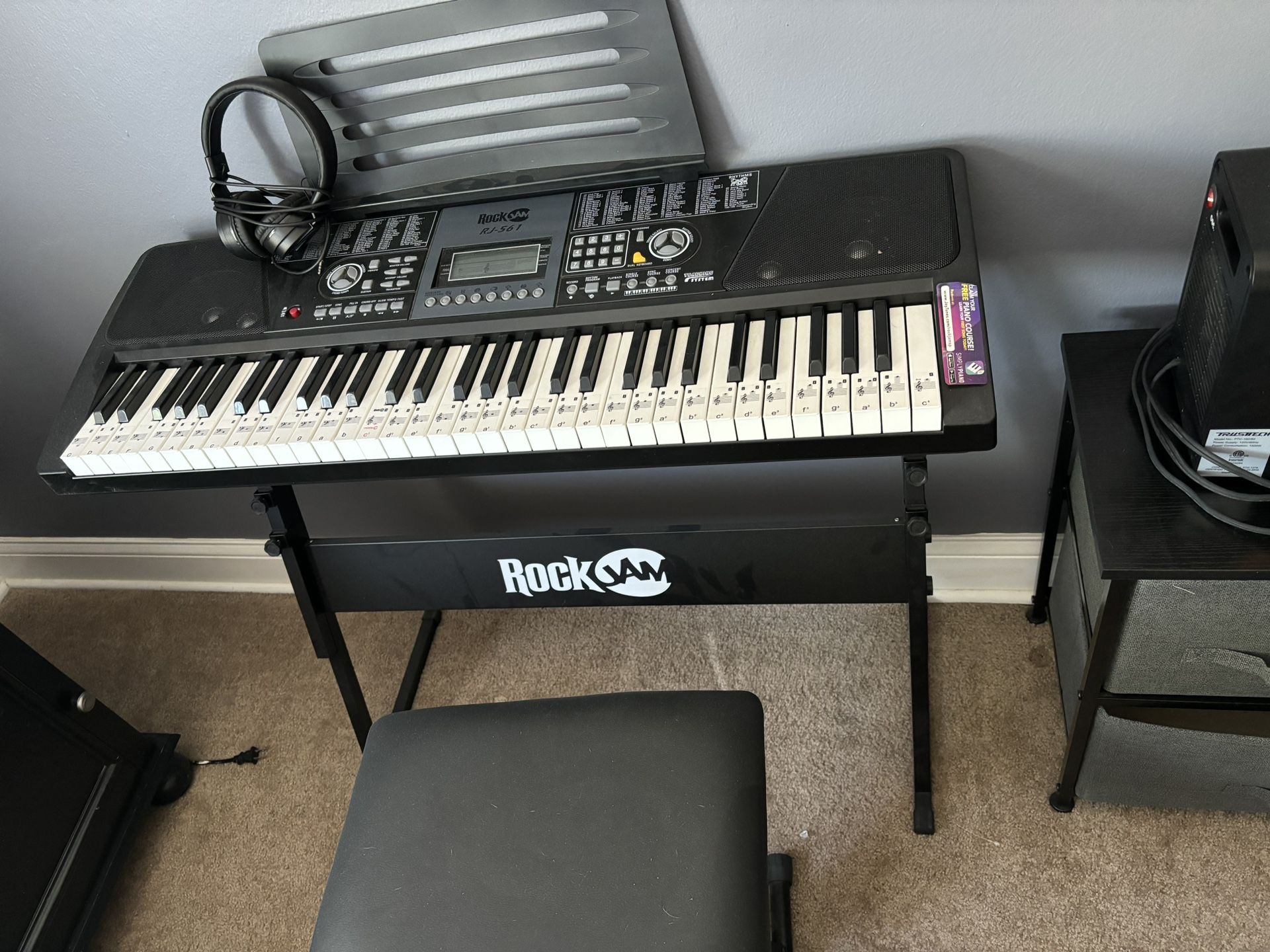 RockJam 61 Key Keyboard Piano with Stand, Bench, Headphones, Simply App & Keynote Stickers. Like new. Barely used.