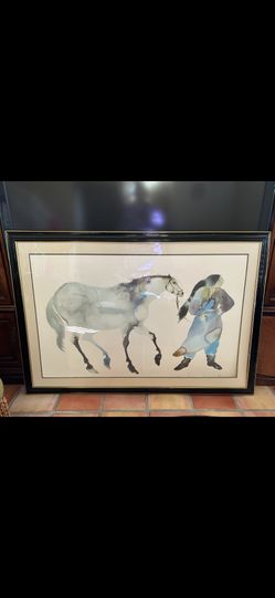 The image is a print titled "She Walks With Horses" by Carol Grigg, an American artist born in 1942. It depicts a Native American woman with a horse, 