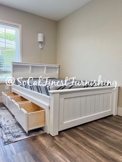 White full bed and mattress with drawers