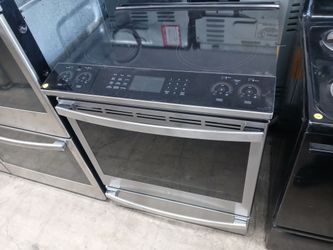 GE stainless steel induction glass-top slide-in range - Free delivery
