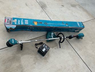 Shop Makita XGT 40V max Brushless Cordless 15 in. String Trimmer Kit (4.0 Ah)
