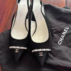 Chanel black suede high heels
