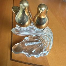 Vintage art glass sculpture featuring two gold-colored birds perched on a clear glass wave base