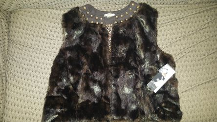 Peter Nygard fur vest