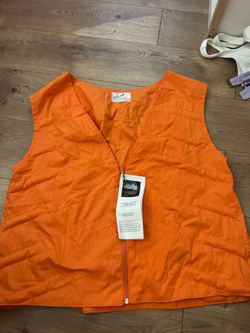 Vintage NWT men’s hunting men’s orange vest size XXL ( it is heavy it has like sand inside )