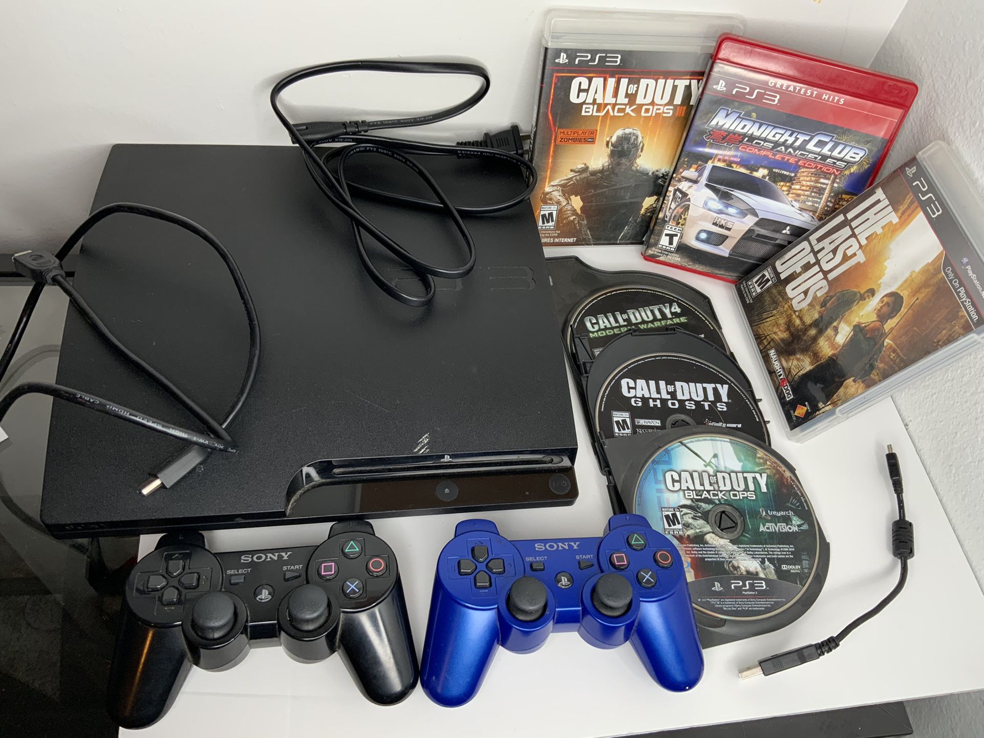 PlayStation 3 slim (PS3) Bundle, TESTED AND WORKING, playstation, 2 wireless DualShock controllers, 6 games, power cords & charger