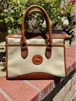 Dooney and Bourke cream and brown leather satchel