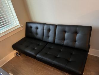 Black leather fouton