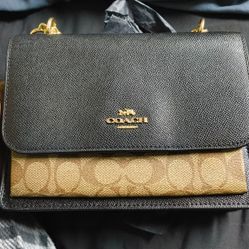 Purse didn't fit everything so now it's for sale