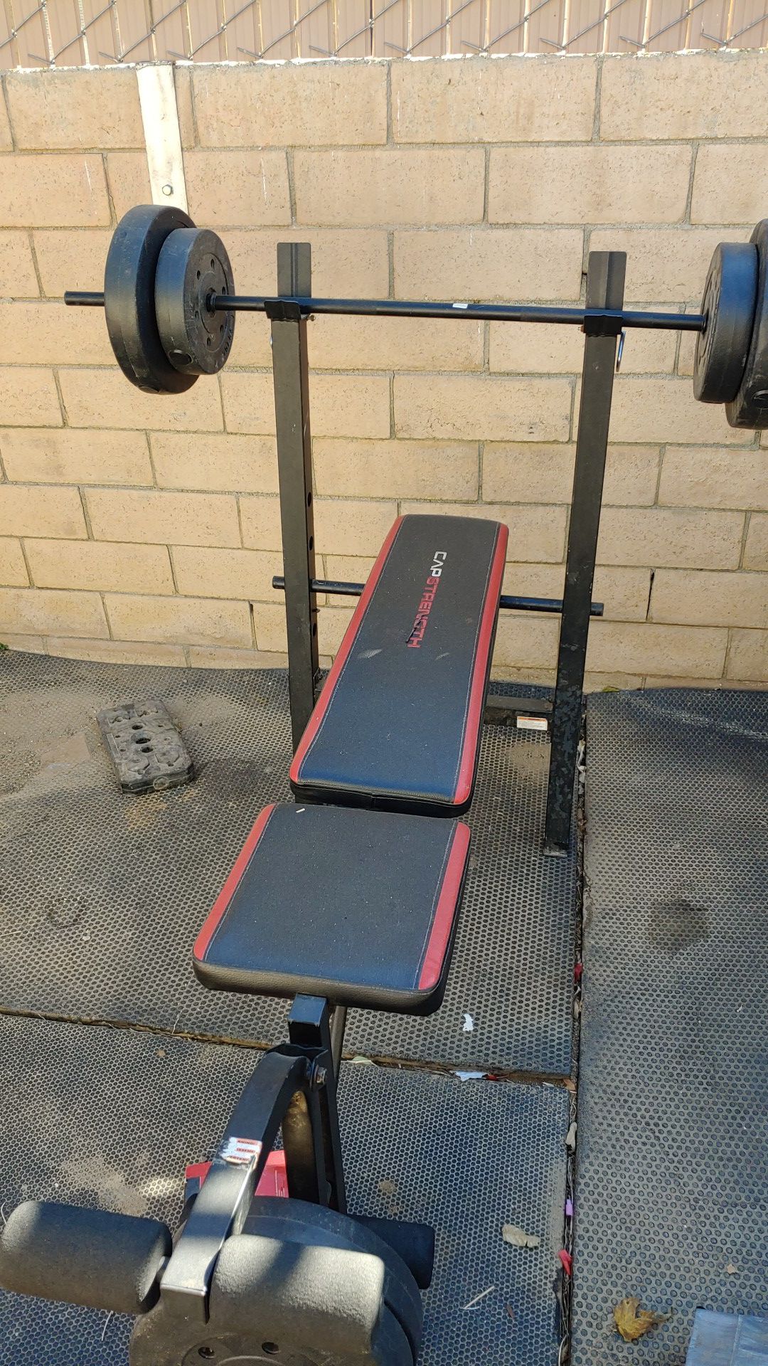 Weight bench with all weights. 10/26