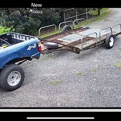 Utility Trailer And A All Aluminum Trailer