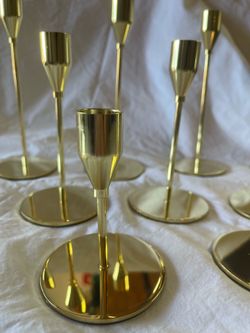 Candlestick holders in gold