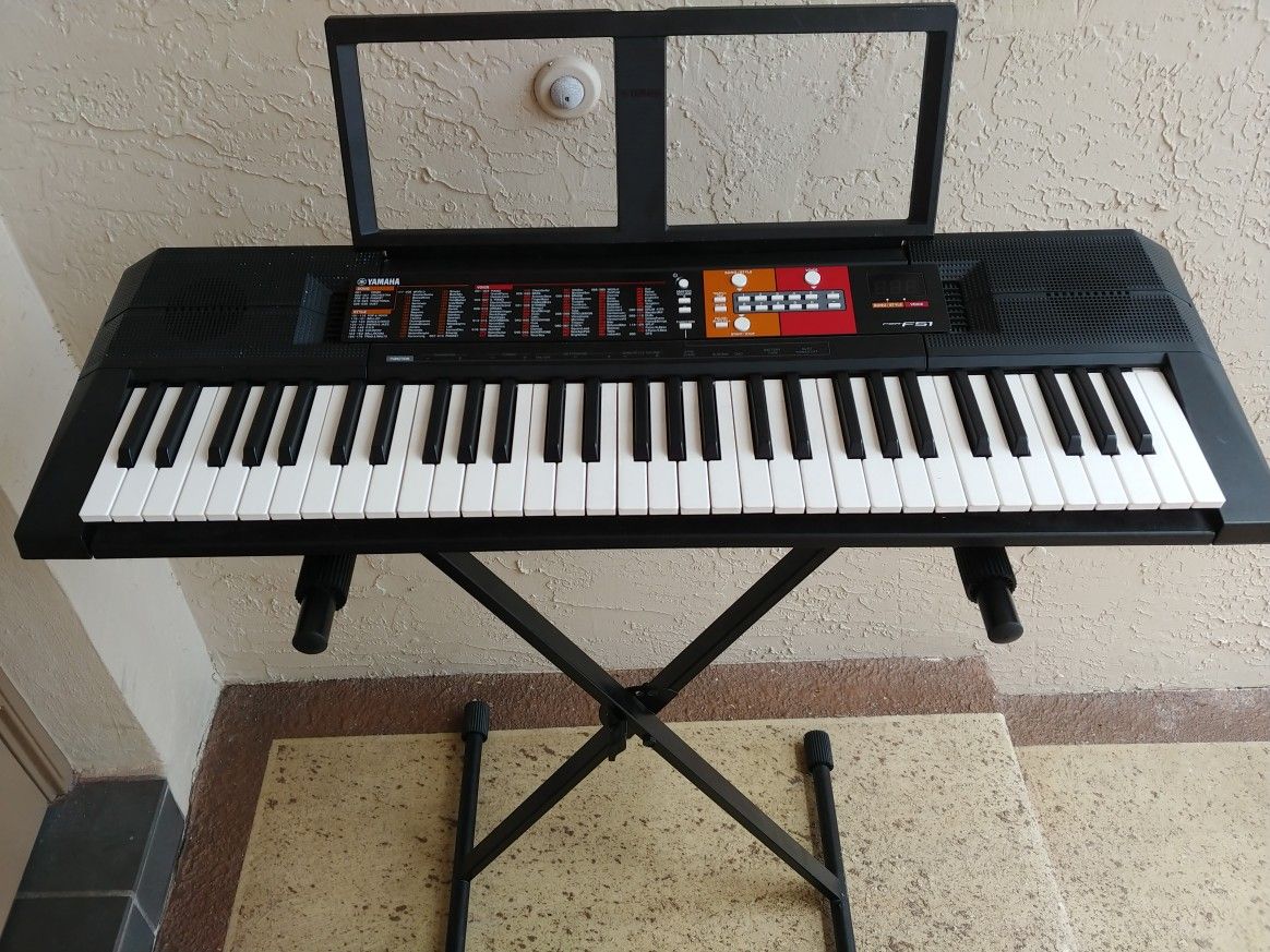 Yamaha Keyboard PSR-F51 Like New With Keyboard Stand And Power Supply Also Works On Batteries