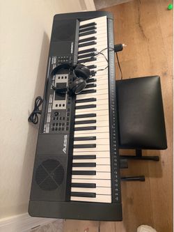 Keyboard with chair and headphones