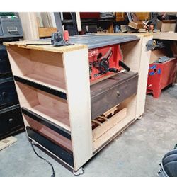 Table Saw Cabinet With Collapsible Run Off Table. Willing To Sell With Or Without Saw 