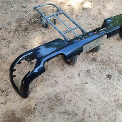 Dark Gray Rear Bumper For 2019 To 24 Chevy Or GMC 1500 No Sensors Holes And Dual Exhaust