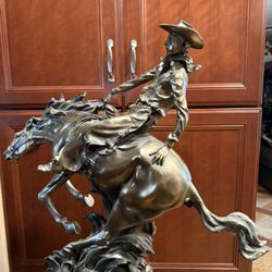 COWBOY ON HORSE STATUES 