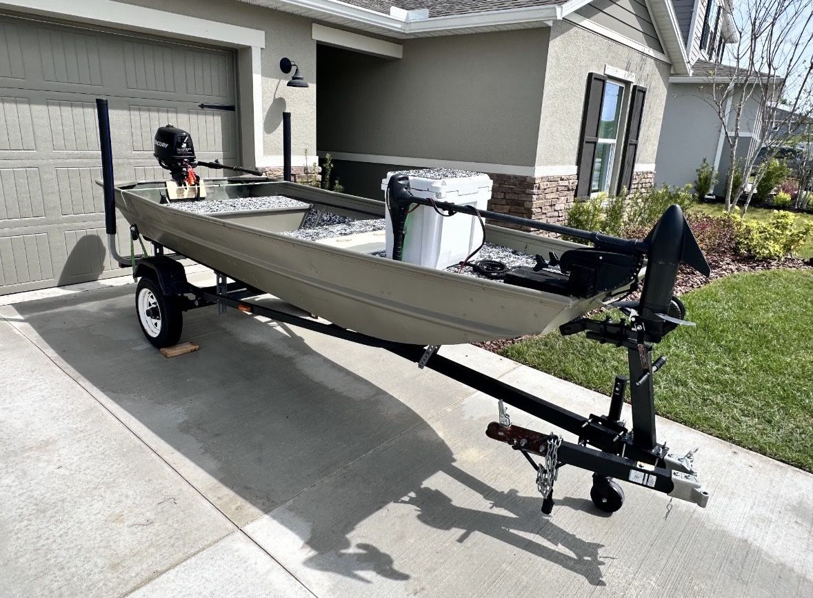1999 Jon Boat with 4 HP motor and steel trailer