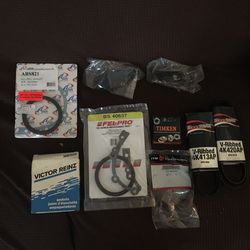 Unused Auto parts . Belts, gaskets, Window Cranks.