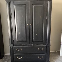 Distressed black TV armoire cabinet